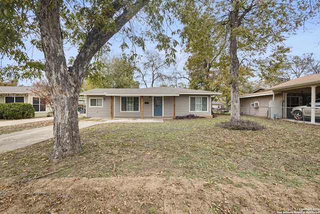 ranch-style house featuring a porch