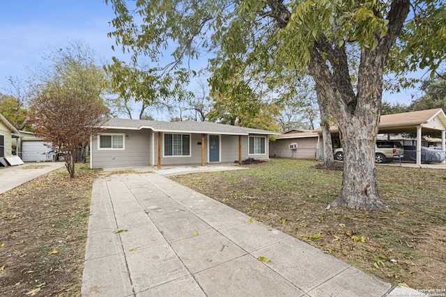 ranch-style house with covered porch