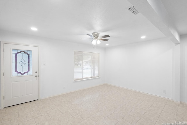 entryway featuring ceiling fan