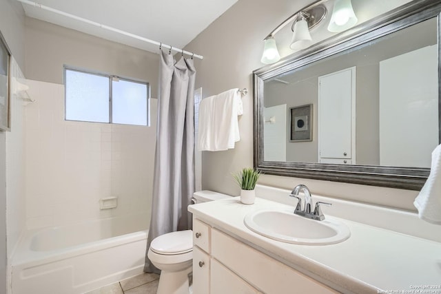 full bathroom featuring tile patterned floors, shower / bath combo, toilet, and vanity