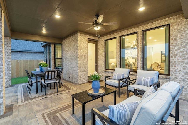 view of patio / terrace featuring ceiling fan and an outdoor hangout area