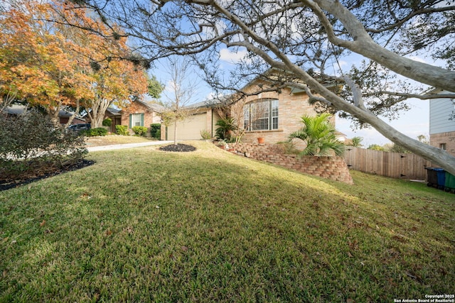 single story home with a front lawn and a garage