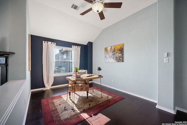 dining space featuring dark wood-type flooring, ceiling fan, and lofted ceiling