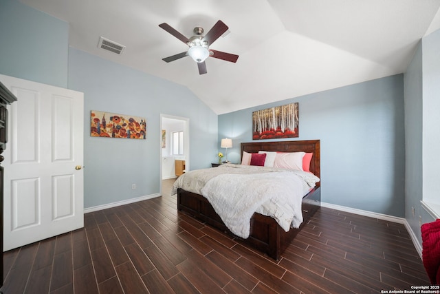 bedroom featuring ceiling fan, connected bathroom, and lofted ceiling