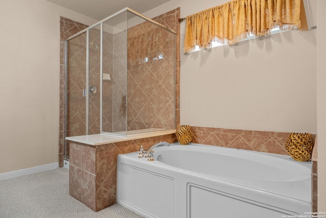 bathroom with plus walk in shower and tile patterned floors