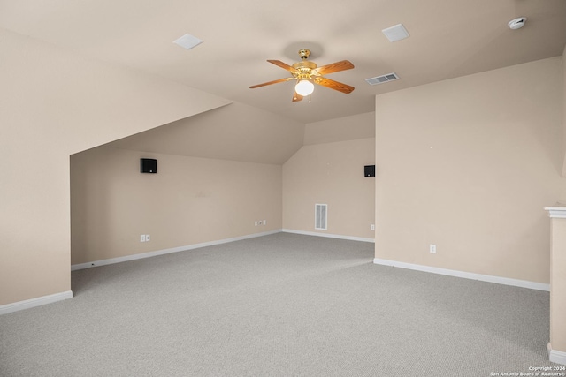 bonus room featuring ceiling fan, light colored carpet, and vaulted ceiling