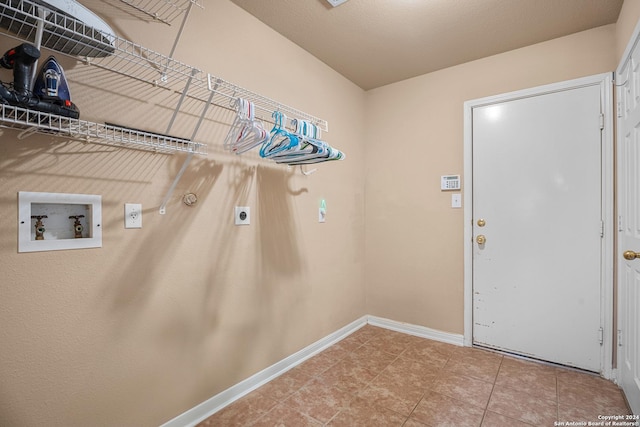 laundry room with electric dryer hookup, hookup for a gas dryer, and hookup for a washing machine