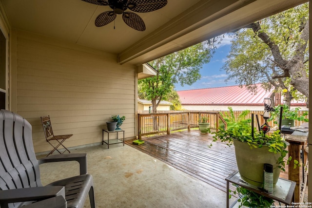 view of patio featuring a deck and ceiling fan