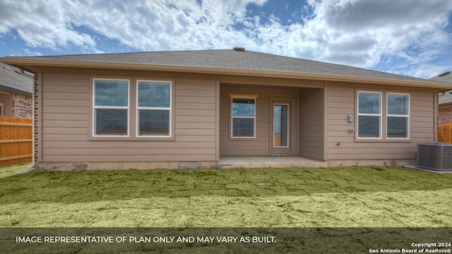 back of property with a lawn, central AC unit, and a patio area