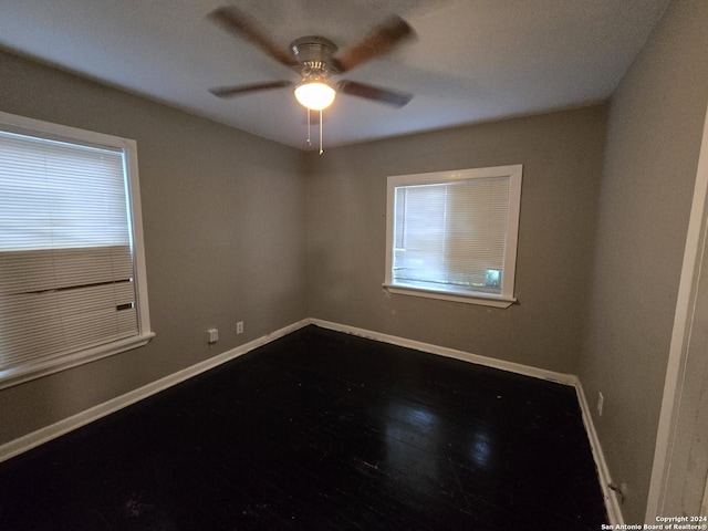 unfurnished room featuring ceiling fan and wood-type flooring