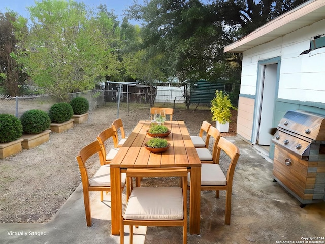 view of patio / terrace with a grill