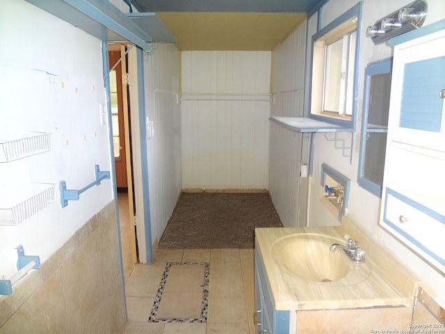 bathroom with vanity and tile patterned floors