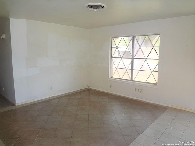 view of tiled empty room