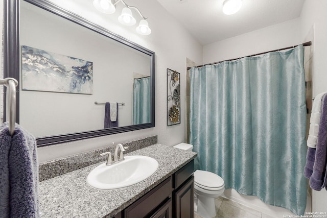 full bathroom featuring tile patterned floors, shower / bathtub combination with curtain, vanity, and toilet