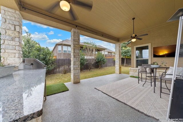 view of patio / terrace with ceiling fan