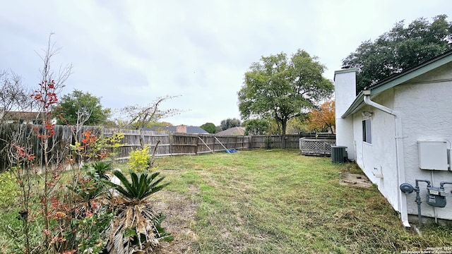 view of yard featuring central AC unit