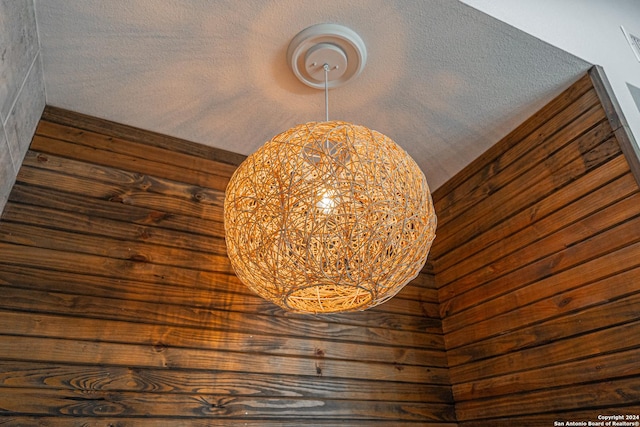 interior details featuring a textured ceiling