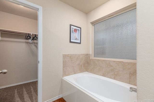 bathroom featuring a tub