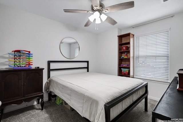 carpeted bedroom featuring ceiling fan