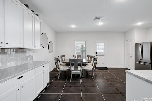 view of tiled dining space