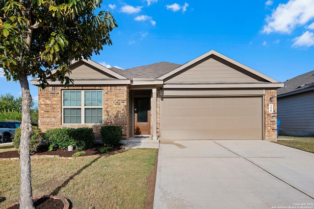 single story home with a front lawn and a garage