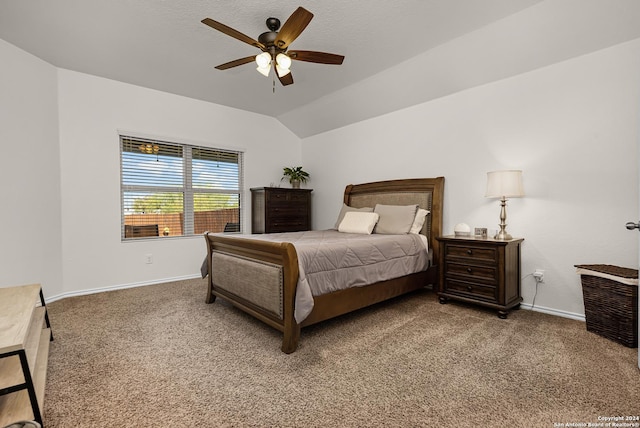 carpeted bedroom featuring ceiling fan and lofted ceiling