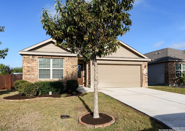 single story home featuring a front yard and a garage