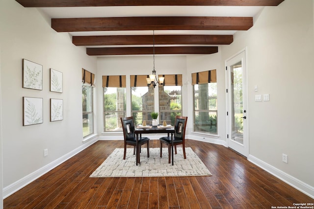 dining room with dark hardwood / wood-style floors, beam ceiling, and a chandelier