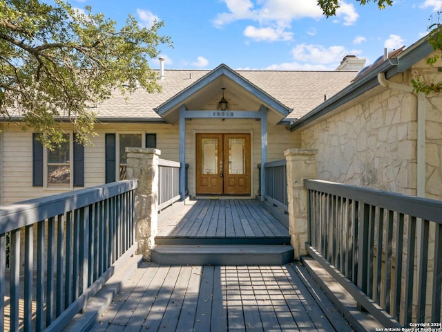 property entrance featuring french doors