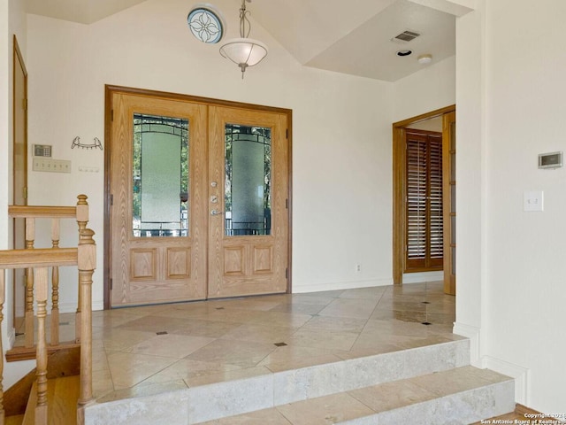 entryway featuring french doors