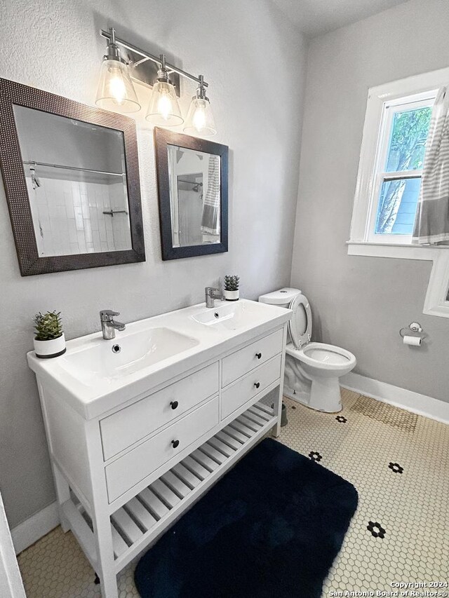 939 Avant Ave, San Antonio, TX 78210 - bathroom with double vanity and a shower