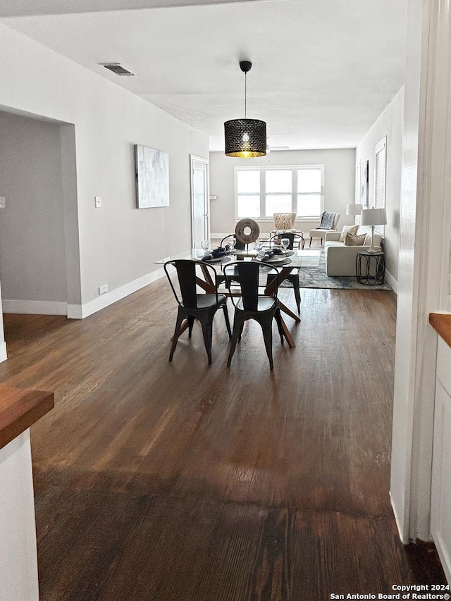 939 Avant Ave, San Antonio, TX 78210 - dining space with dark wood-style floors and baseboards