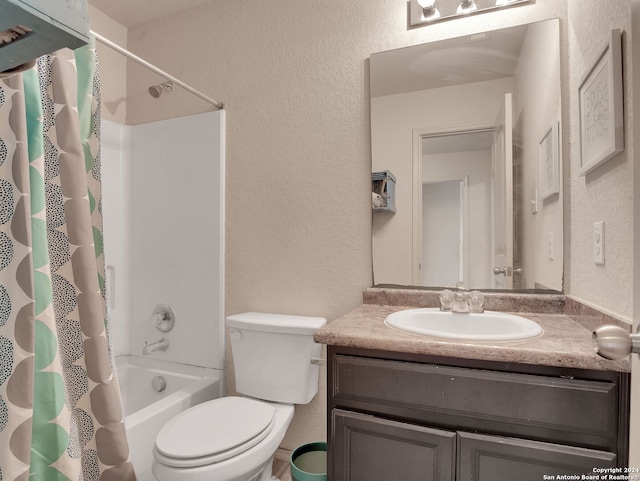 full bathroom with vanity, toilet, and shower / bath combo with shower curtain