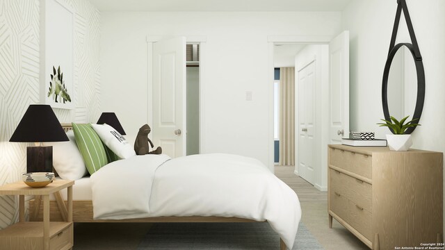 bedroom featuring wood-type flooring