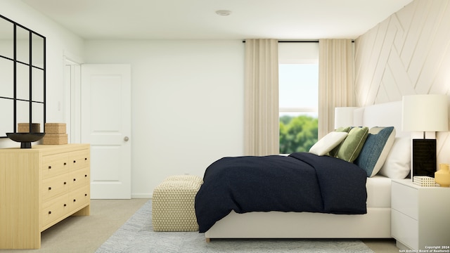 bedroom with light colored carpet