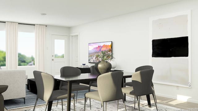 dining area with light wood-type flooring