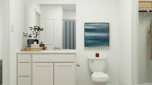 bathroom featuring a shower with curtain, vanity, and toilet