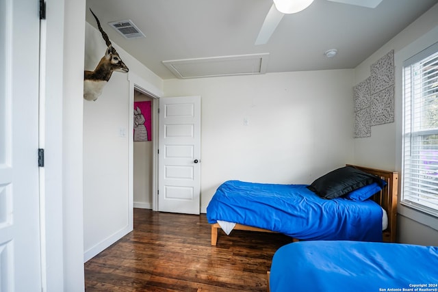 bedroom featuring ceiling fan and dark hardwood / wood-style floors