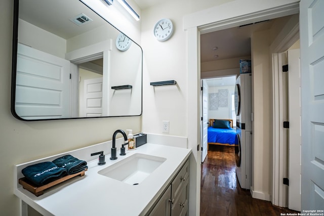 bathroom featuring vanity and hardwood / wood-style flooring