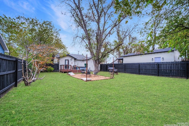 view of yard featuring a deck