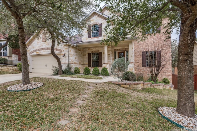 view of front of house featuring a front yard and a garage