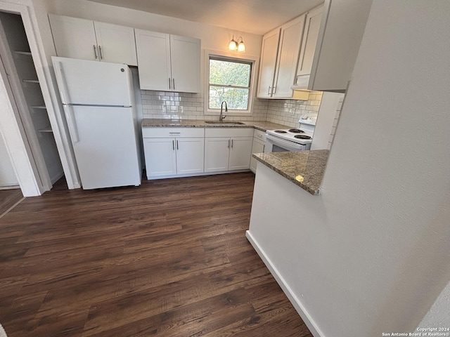 kitchen featuring white cabinetry, sink, tasteful backsplash, dark hardwood / wood-style floors, and white appliances