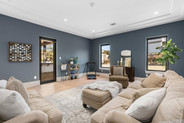 living room featuring plenty of natural light and light wood-type flooring