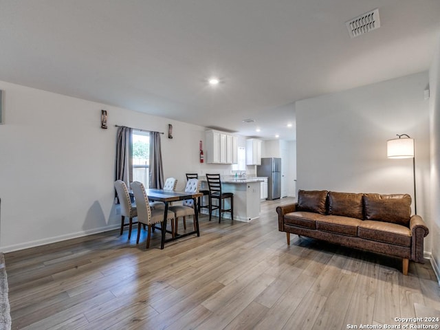 living room featuring light hardwood / wood-style flooring