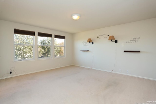 empty room featuring carpet flooring