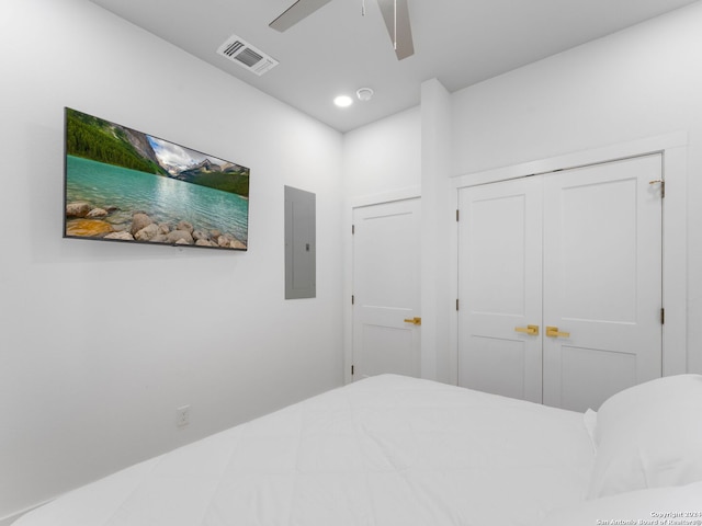 bedroom featuring electric panel and ceiling fan