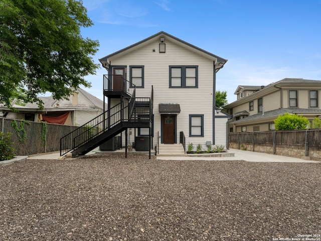 view of front of property with central AC