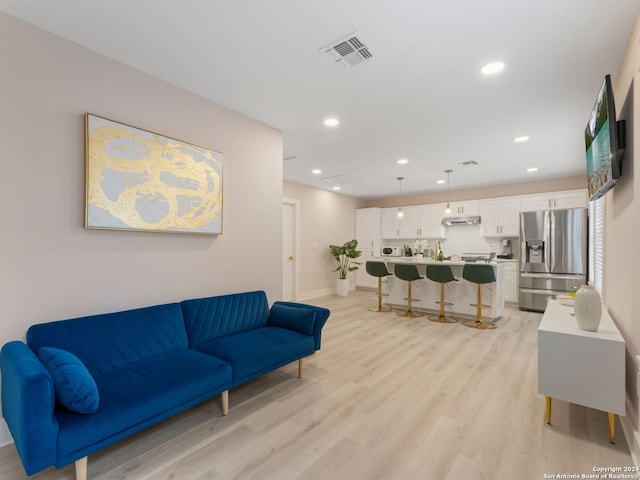 living room featuring light hardwood / wood-style floors