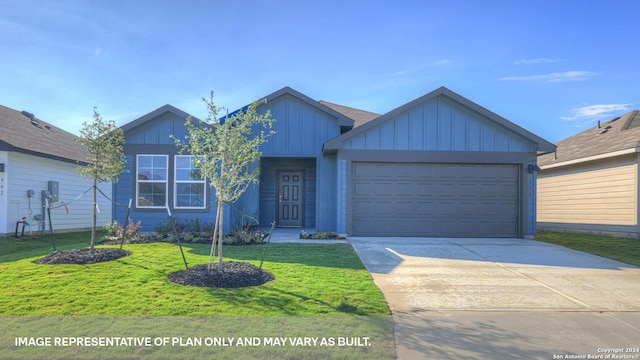 view of front of home with a garage and a front lawn