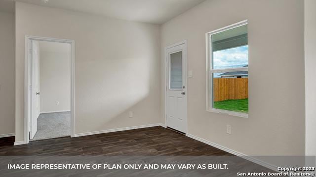 unfurnished room featuring dark hardwood / wood-style floors